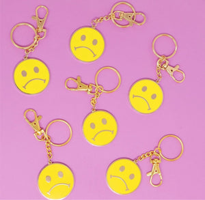 
            
                Load image into Gallery viewer, Sad Smiley Keychain
            
        